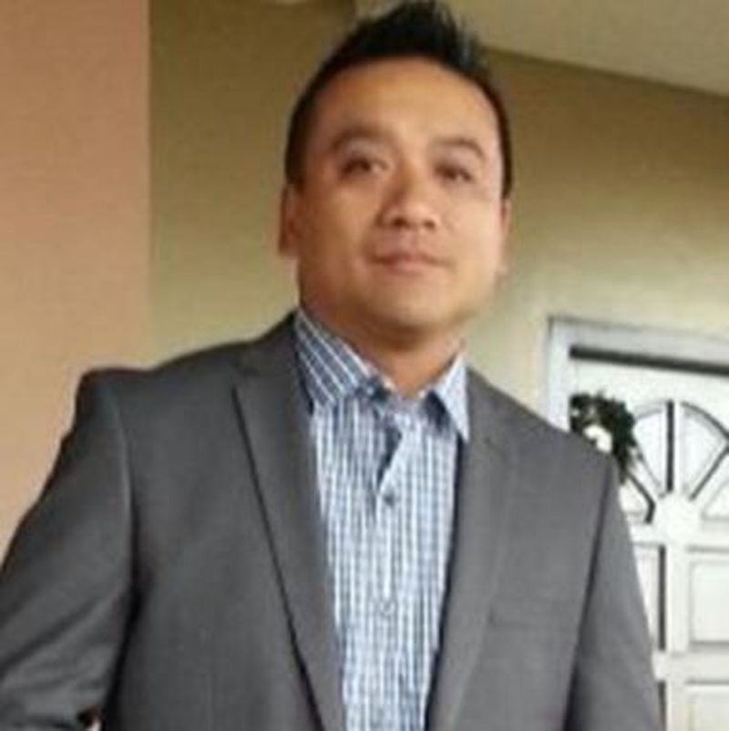 Above: Randolph Aquino, 46, wanted in Fraud investigation.