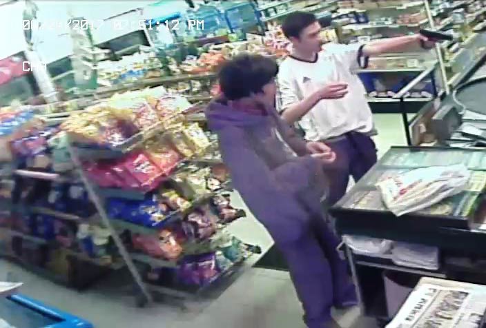 RCMP have released surveillance photos after an armed robbery at a North Battleford business on Thursday.