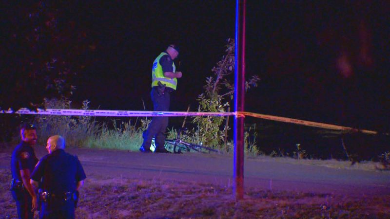 Emergency crews respond to a crash on a bike path in the area of Memorial Drive and Centre Street on Monday, Aug. 28, 2017. 