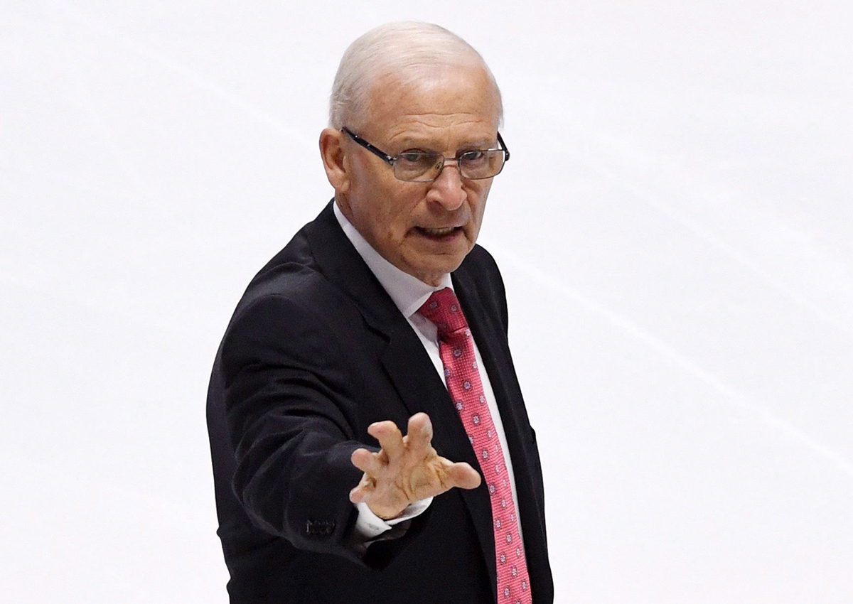 Senior hockey advisor to the Ottawa Senators, Bryan Murray, waves as he leaves the ice after being inducted as the first member of the team's new "ring of honour." .