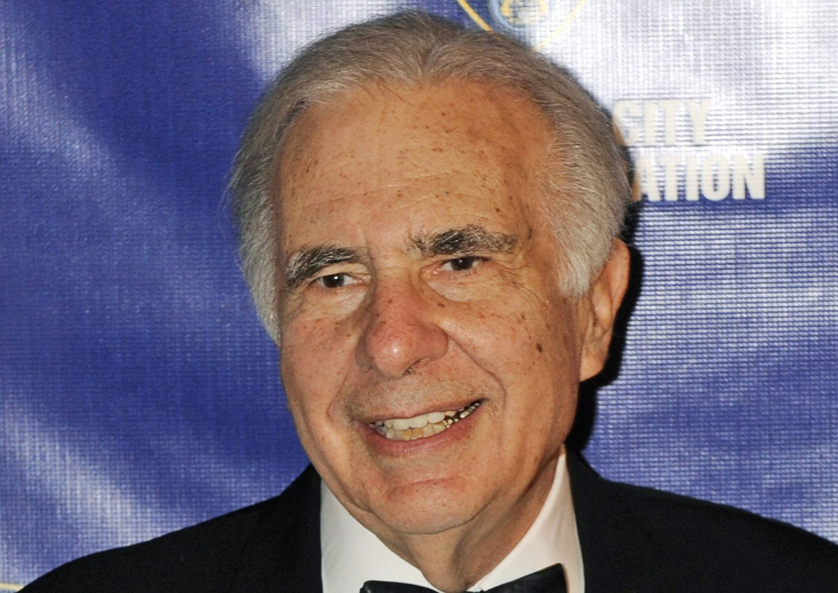  In this March 16, 2010, file photo, financier Carl Icahn poses for photos upon arriving for the annual New York City Police Foundation Gala in New York. 