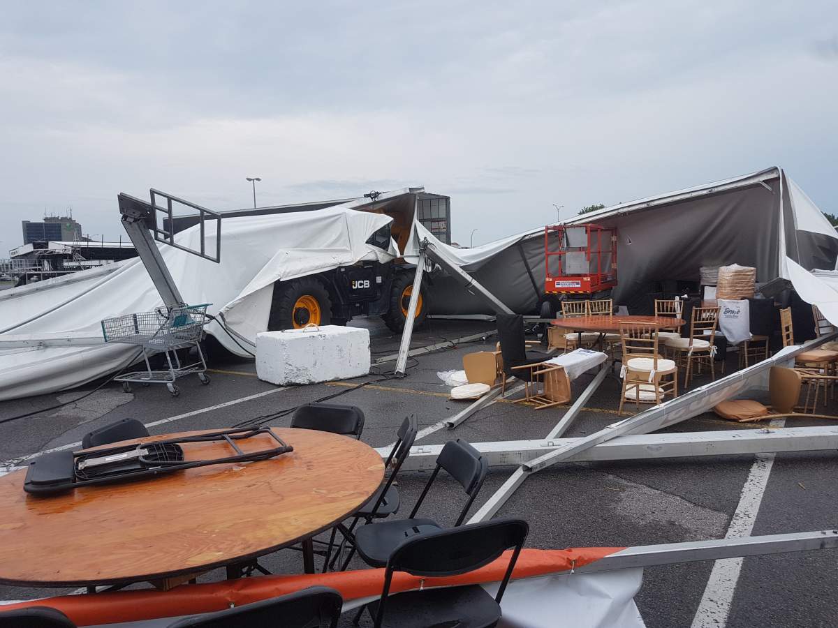 Tables and chairs in ruin after a storm hit Pointe-Claire on Tuesday, August 22, 2017.