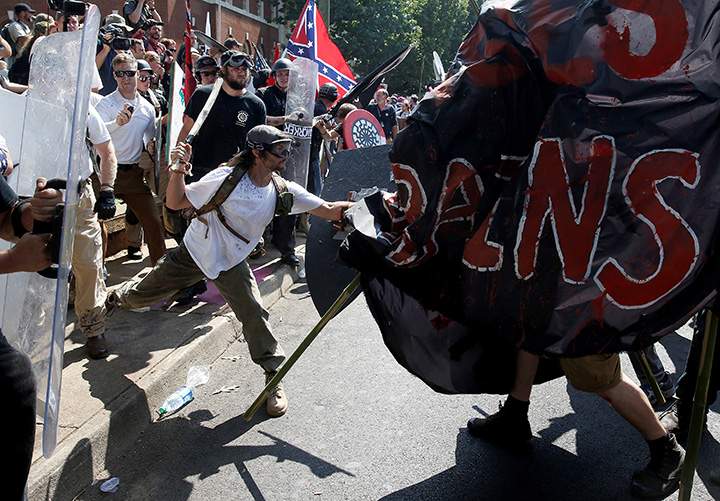 White supremacists clash with counter protesters at a rally in Charlottesville, Virginia, August 12, 2017.