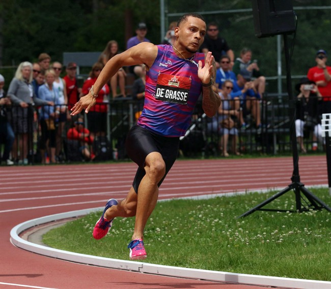 Andre De Grasse takes the lead to win his heat in the preliminary men's 200-metre race at the Canadian Track and Field Championships in Ottawa, Saturday, July 8 2017.