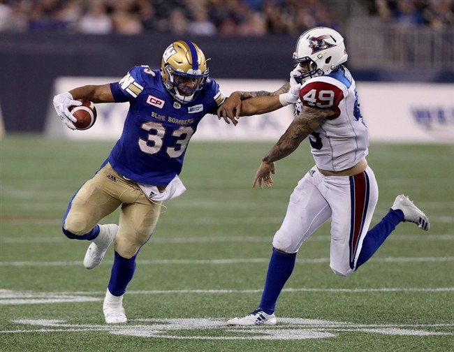 If their last meeting was an indication, the clash Thursday night between the Montreal Alouettes and Winnipeg Blue Bombers should be quite the offensive spectacle. Winnipeg Blue Bombers running back Andrew Harris (33) stiff arms Montreal Alouettes linebacker Dominique Tovell (49) during second half CFL football action, in Winnipeg on Thursday, July 27, 2017. 