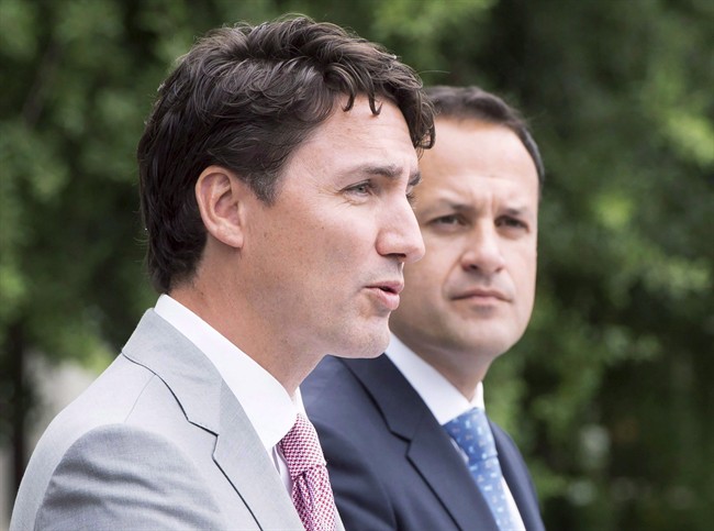 Prime Minister Justin Trudeau, left, speaks to the media as Irish Taoiseach Leo Varadkar looks on at Farmleigh House, on Tuesday, July 4, 2017, in Dublin.