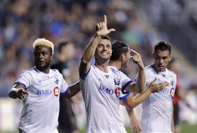Montreal Impact's Blerim Dzemaili gestures to the crowd after scoring a goal during the second half of the team's MLS soccer match against the Philadelphia Union, in Chester, Pa., on Saturday, Aug. 12, 2017.