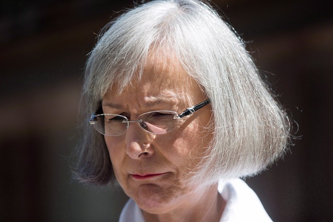 Marion Buller, Chief Commissioner of the National Inquiry into Missing and Murdered Indigenous Women and Girls, pauses while speaking to a reporter after a news conference at Haida House at the Museum of Anthropology, in Vancouver on Thursday, July 6, 2017.