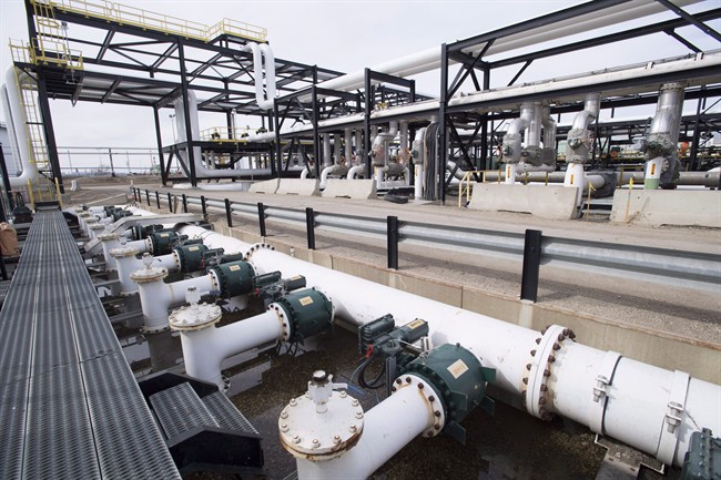 Pipes are seen at the Kinder Morgan Trans Mountain facility in Edmonton, Alta. The City of Surrey withdrew their 'statement of opposition' at National Energy Board's Detailed Route hearings in Burnaby on Tuesday.