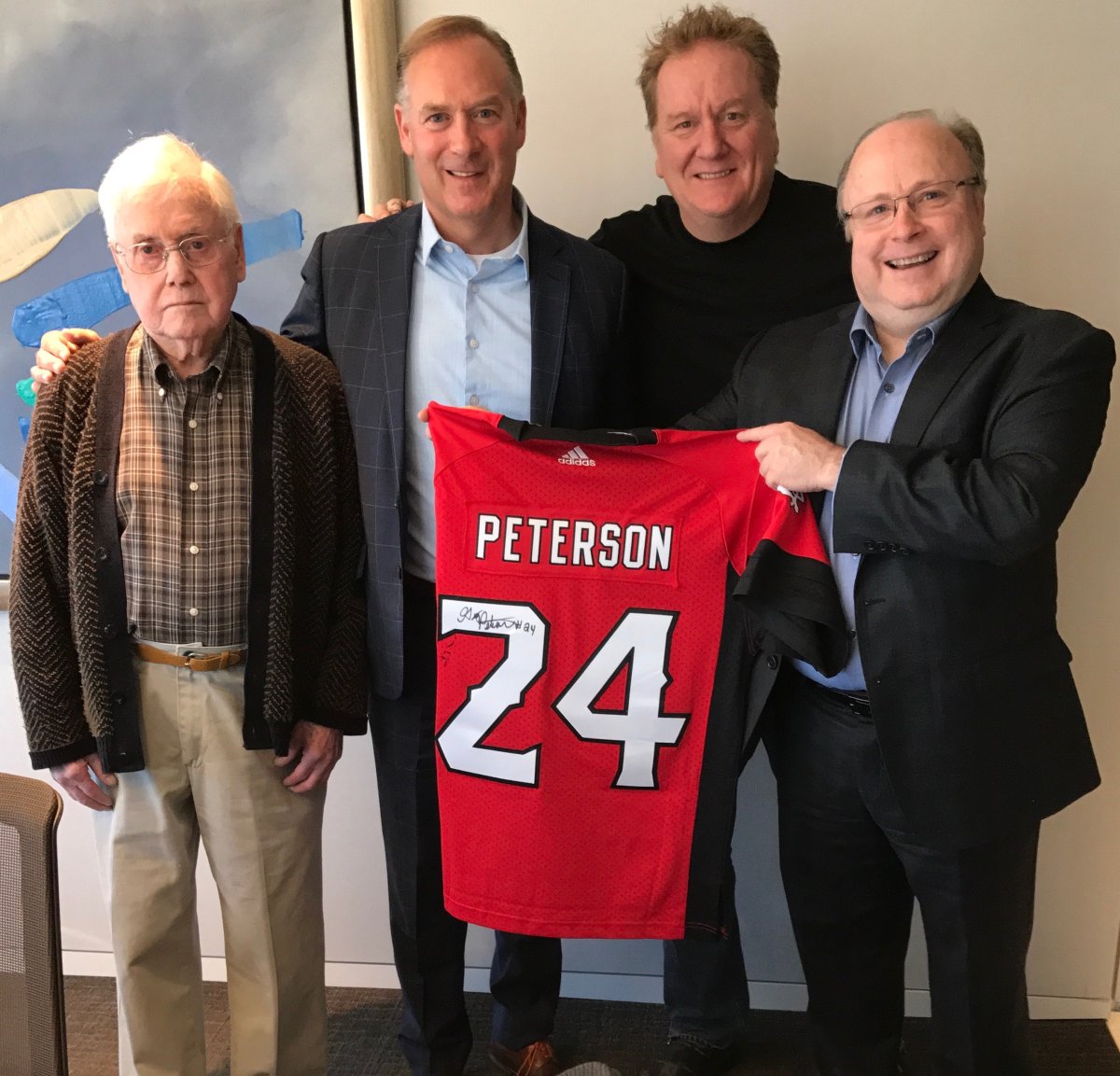 Dave Conn had the winning bid on former Calgary Stampeder Greg Peterson's #24 jersey.