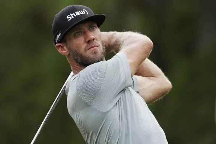Graham DeLaet watches his tee shot on the third hole during the final round of the PGA Championship golf tournament at the Quail Hollow Club Sunday, Aug. 13, 2017, in Charlotte, N.C.