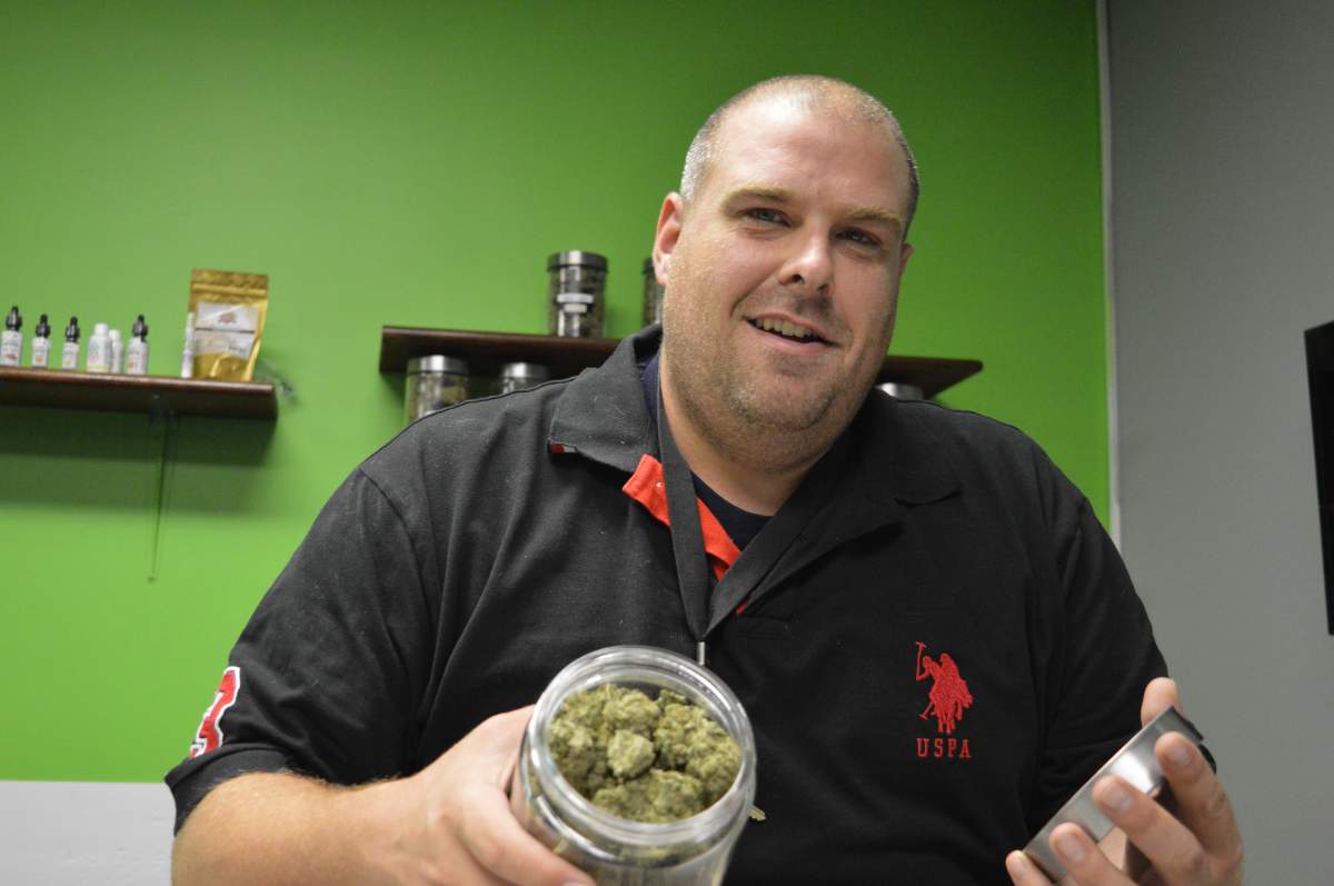 Mal McMeekin displays dried marijuana in this photo from August 2016.