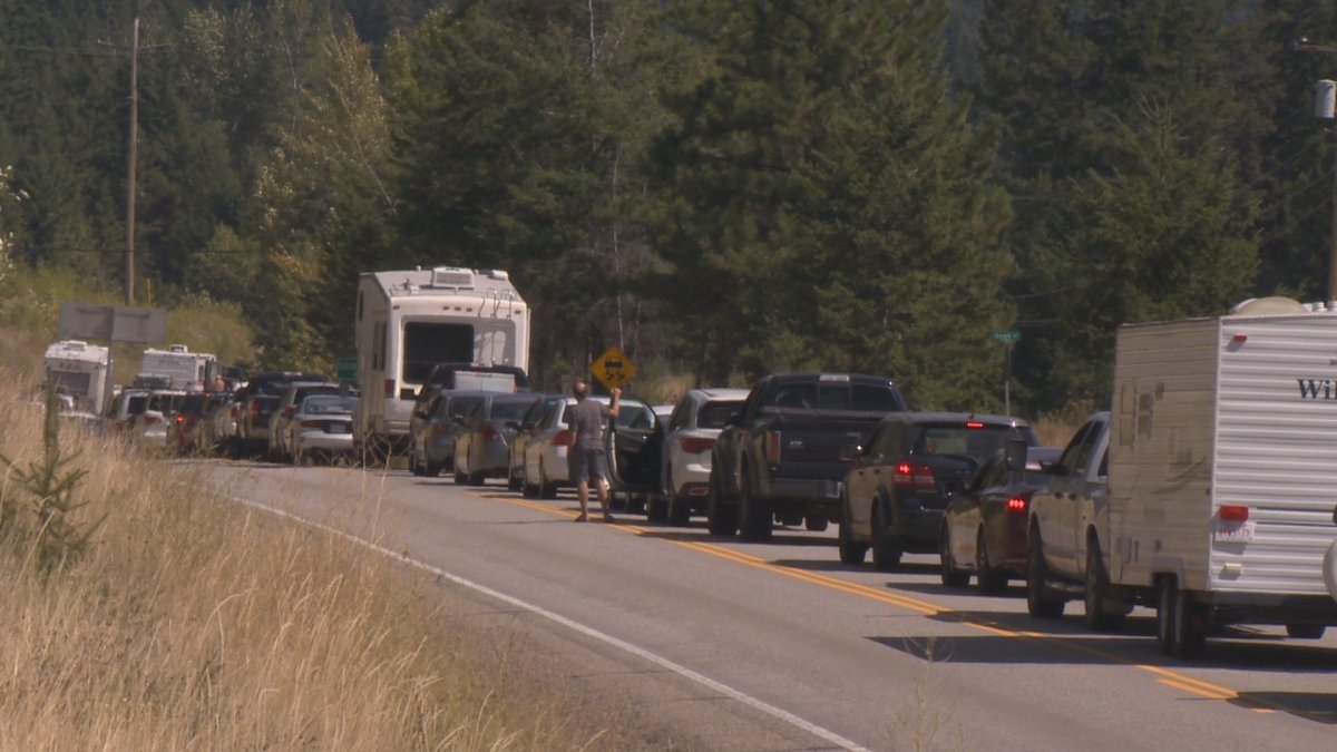 Travellers stalled on Highway near Kelowna 33 due to wildfire suppression efforts. 