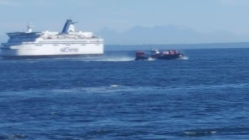 The Coast Guard hovercraft attends a boat rescue near Mayne Island on Sunday.