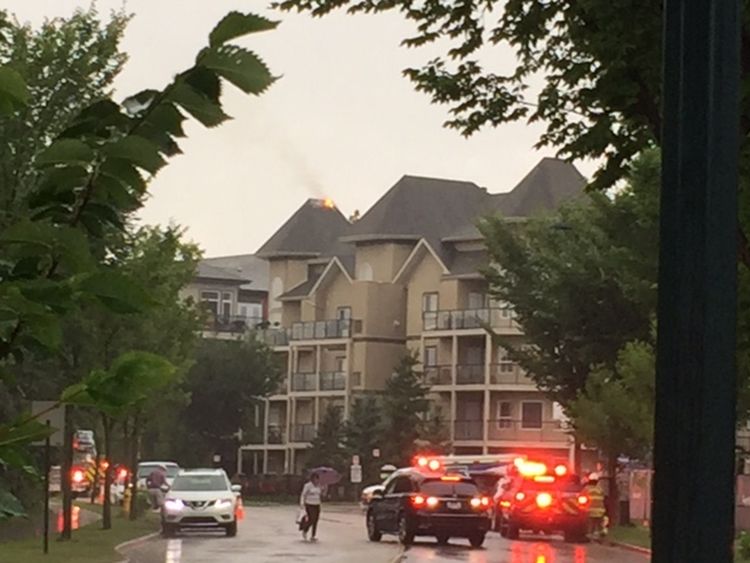 Fire investigators believe a lightning strike sparked a fire in a south-side Edmonton condo building Saturday.  
