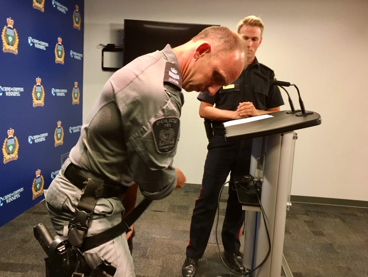 A tactical officer demonstrates how to use a ‘tactical tourniquet’ Friday morning.