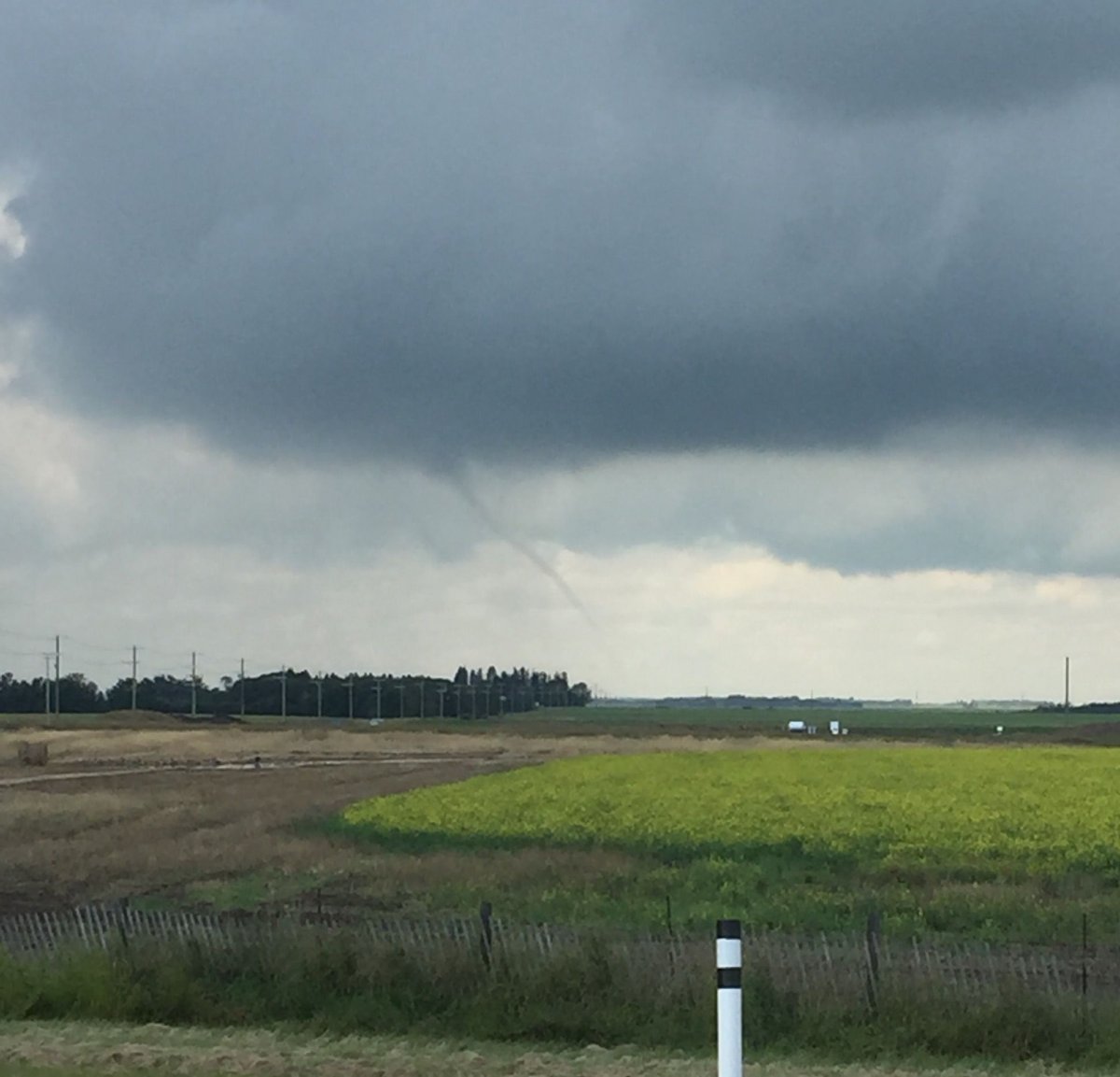 A funnel cloud spotted near Leduc Saturday afternoon shortly after a weather advisory was issued.