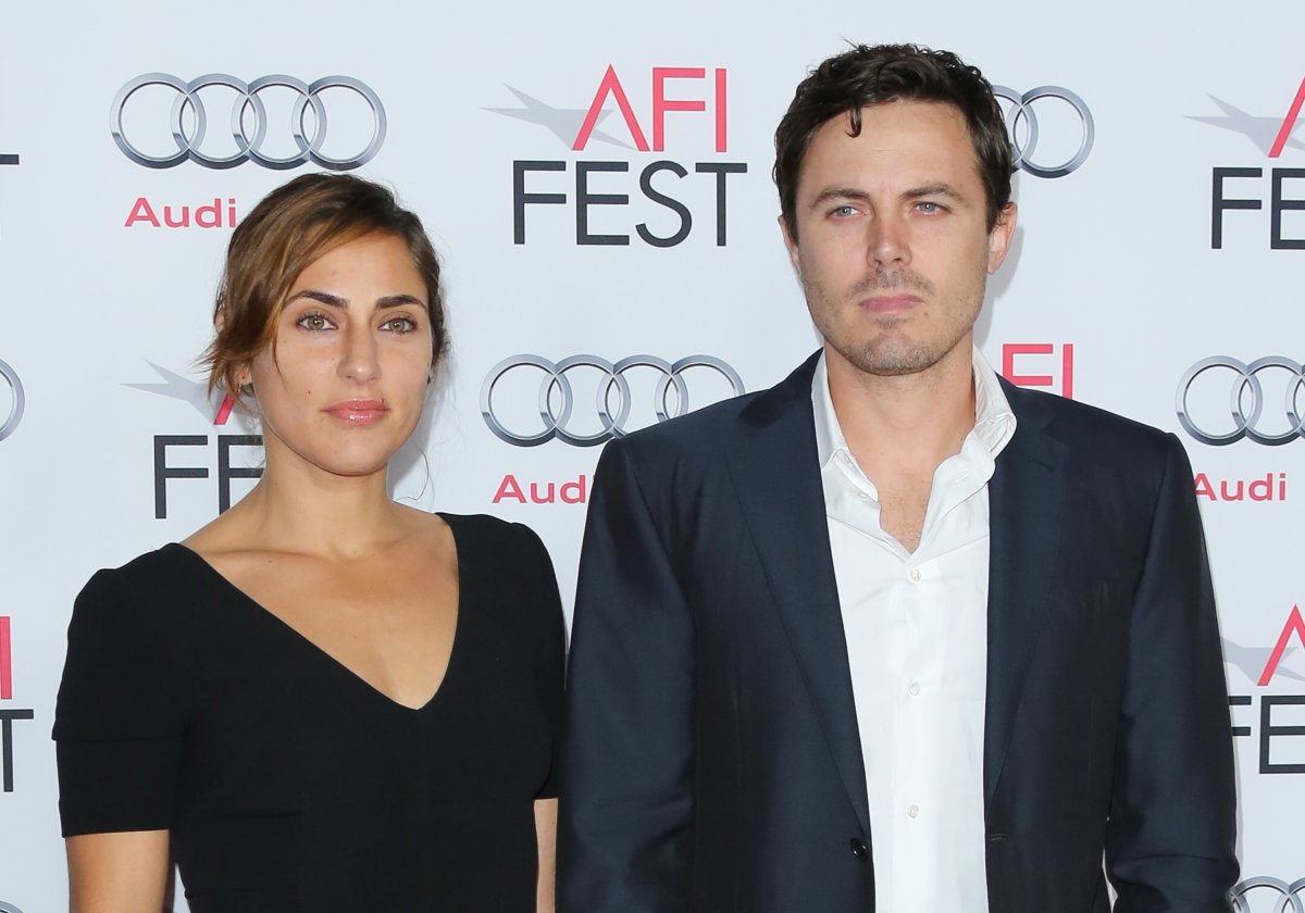  Actors Casey Affleck (R) and Summer Phoenix (L) attend the "Out Of The Furnace" premiere at AFI FEST 2013 at the TCL Chinese Theatre on November 9, 2013 in Hollywood, California.
