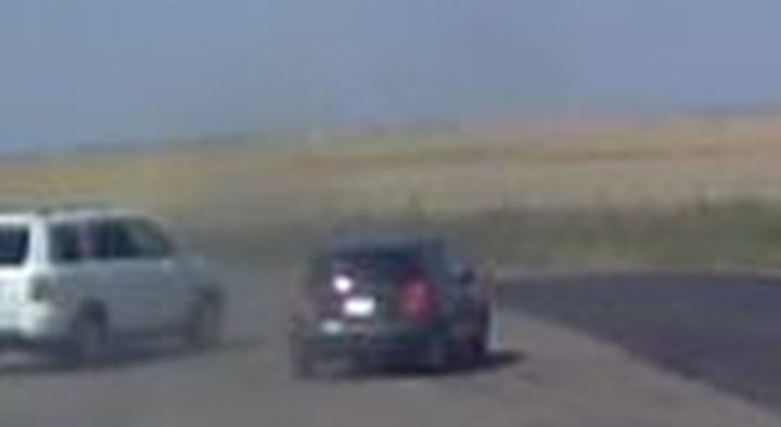 The RCMP are looking for three suspects after a driver had his Honda Pilot SUV carjacked at the Gleichen, Alta. rest stop on Highway 1 on Aug. 21, 2017. Police said the suspects drove up in a small, grey two-door car.