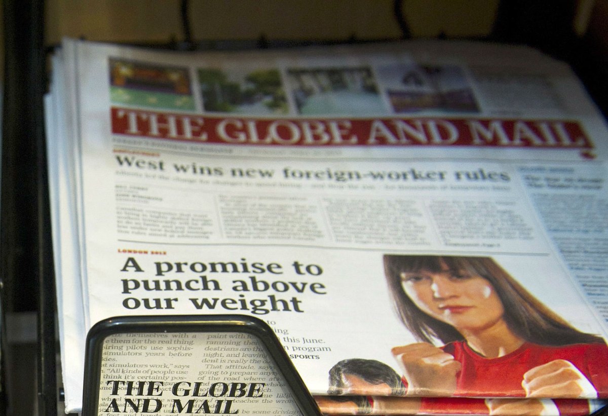 Stacks of The Globe and Mail sit in a news stand in Toronto on Thursday April 26, 2012.