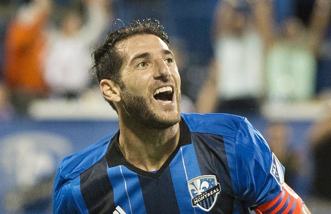 In this file photo, Montreal Impact's Ignacio Piatti reacts after scoring against Real Salt Lake in Montreal. The team announced Piatti has agreed to stay on after his current contract expires in June, 2018. Thursday, Sept. 28, 2017.