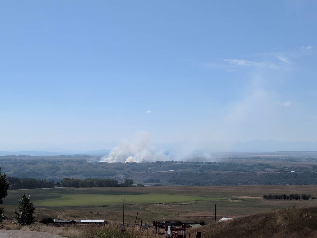 Grass fire near Springbank Sunday. 
