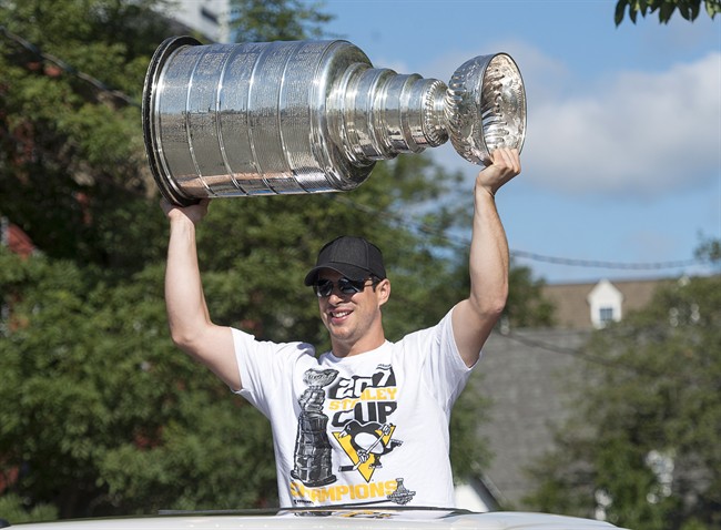 Pittsburgh Penguins captain Sidney Crosby parades the Stanley Cup in Halifax on Monday, Aug. 7, 2017. Crosby, the parade grand marshal, is a three-time Stanley Cup champion and was celebrating his 30th birthday.