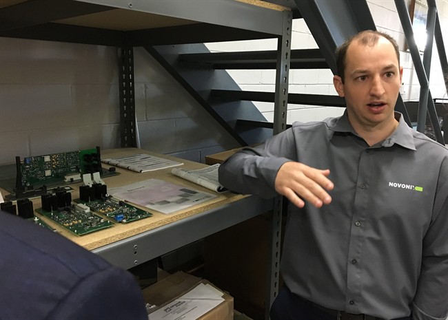 Dr. Chris Burns, president and CEO Novonix Battery Testing Services Inc., explains the company's high-precision battery testing equipment in Dartmouth, N.S., Tuesday, Aug.29, 2017. 