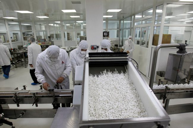 Pharmacists at Hikma Pharmaceuticals in Amman, Jordan package drugs to be exported to the U.S.