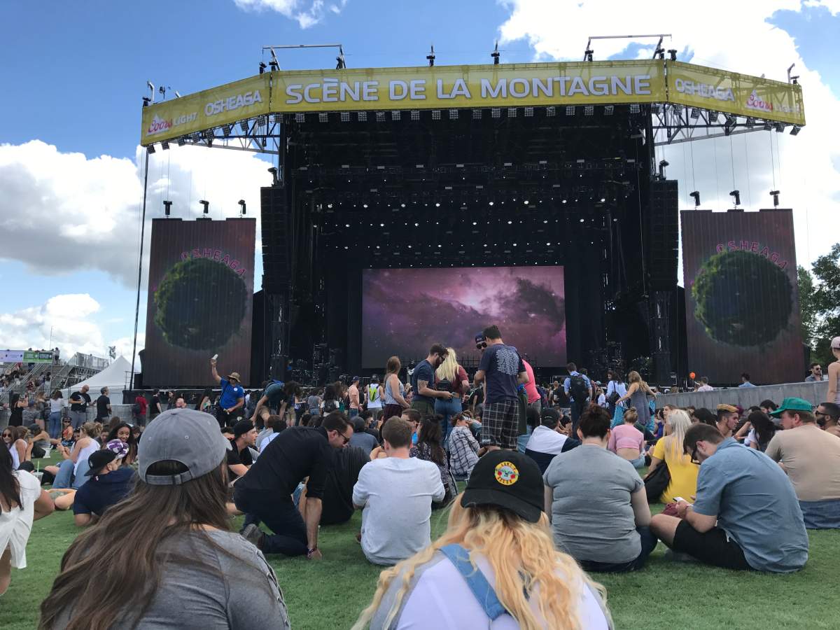 Festivalgoers take a break at the 2017 Osheaga music and art festival.Festivalgoers take a break at the 2017 Osheaga music and art festival.