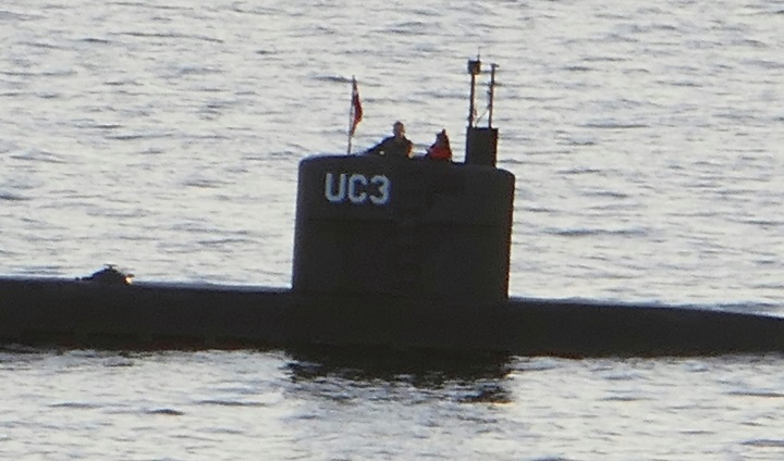 Swedish journalist Kim Wall stands next to a man in the tower of the private submarine “UC3 Nautilus” on August 10, 2017 in Copenhagen Harbour. She has not been seen since.