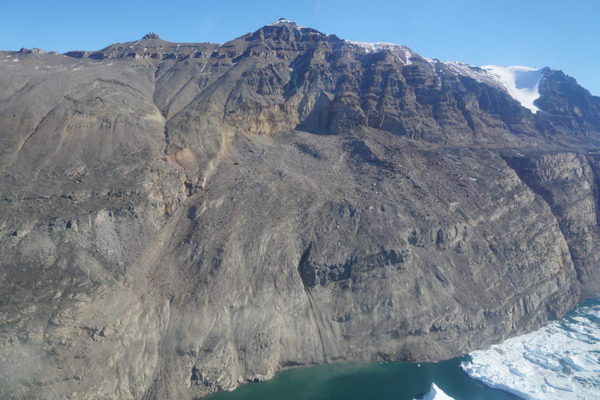 The location of a landslide in Greenland’s Karrat Fjord, which triggered a tsunami that reached heights of over 90 meters. To the left, a section of hillside is unstable enough that it could trigger another.