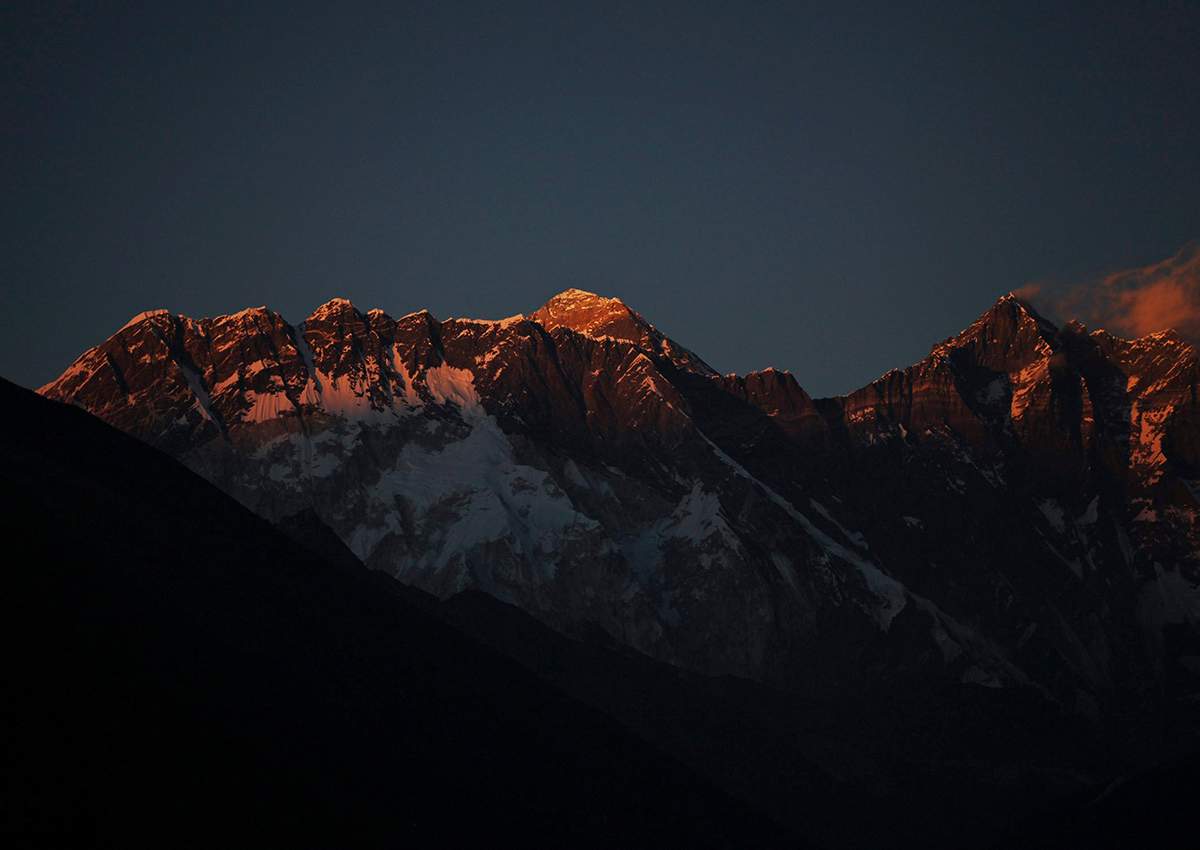 In this Feb. 18, 2016 file photo, Mount Everest, center, and Mount Lhotse, right, are seen from Tengboche, Nepal. 