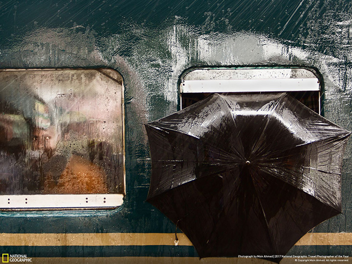 Honourable mention, People: A train coming from Dhaka pauses at Tongi Railway Station in Gazipur, Bangladesh, on a rainy morning.