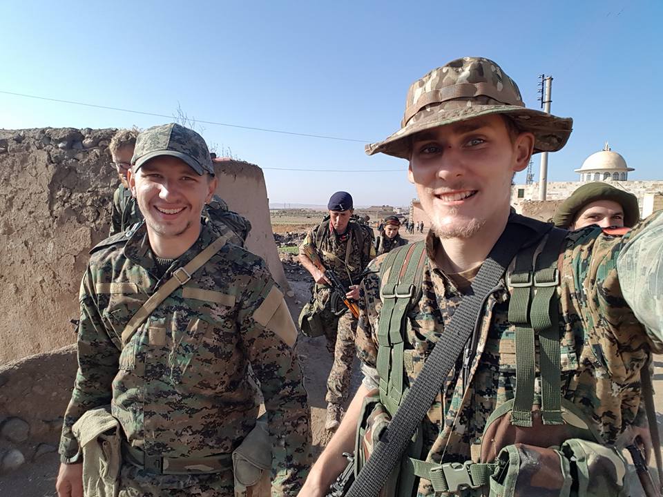 Nazzareno Tassone (left) and Ryan Lock (right) in Northern Syria. Andrew Woodhead can be seen with the beret in the background. (Handout)