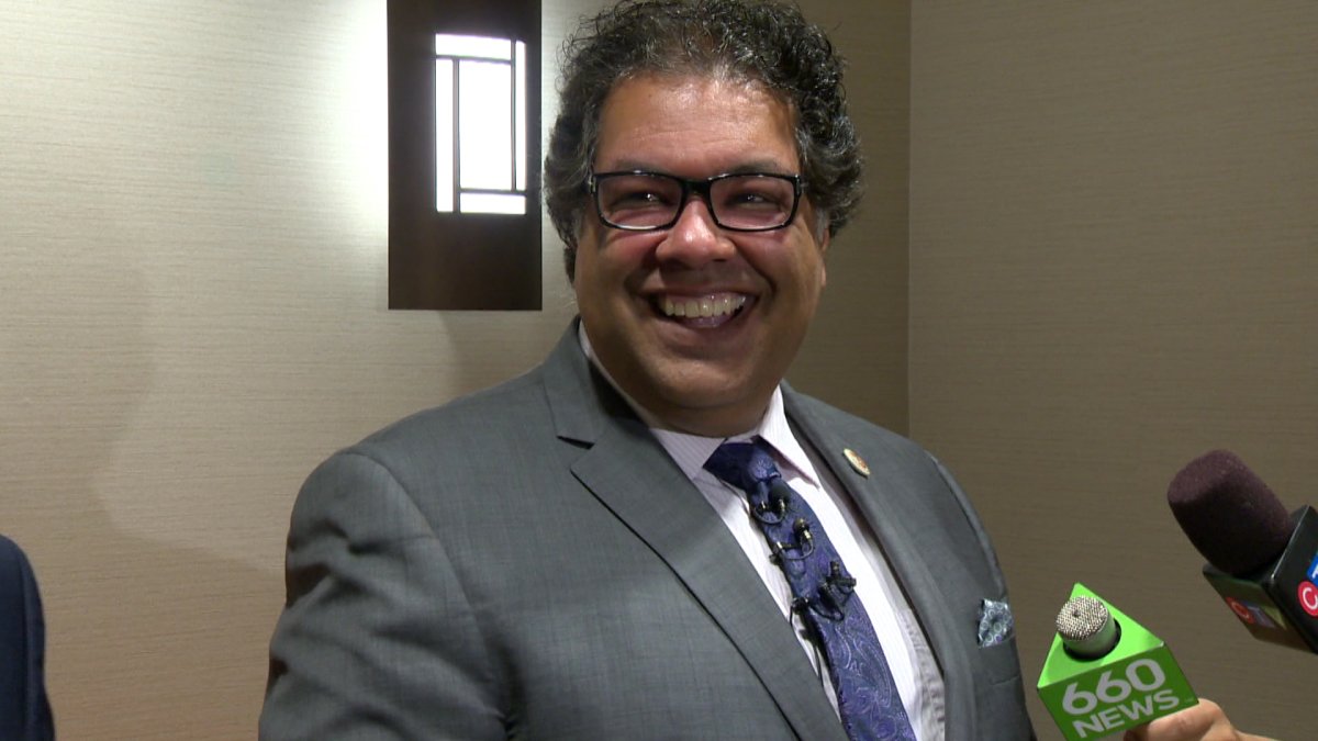 Calgary Mayor Naheed Nenshi has repaid his legal costs from a defamation lawsuit brought forward by Cal Wenzel.