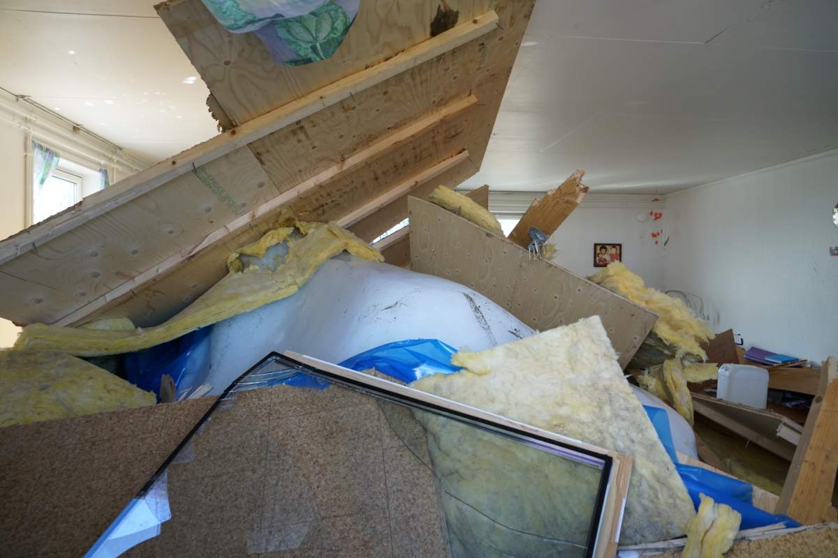 A piece of ice that broke through the floor of a home in Nuugatsiaq, Greeland, after a landslide-triggered tsunami on June 18, 2017.