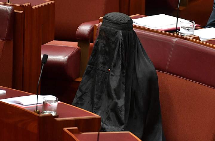 Australian One Nation party leader, Senator Pauline Hanson wears a burka in the Senate chamber at Parliament House in Canberra, Australia, August 17, 2017.