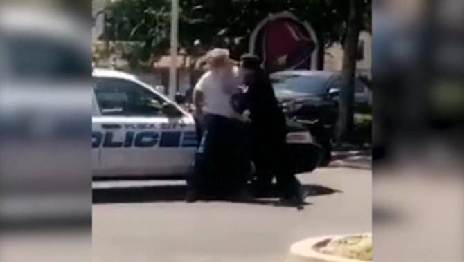 Police investigating after officer caught on camera punching suspect ...