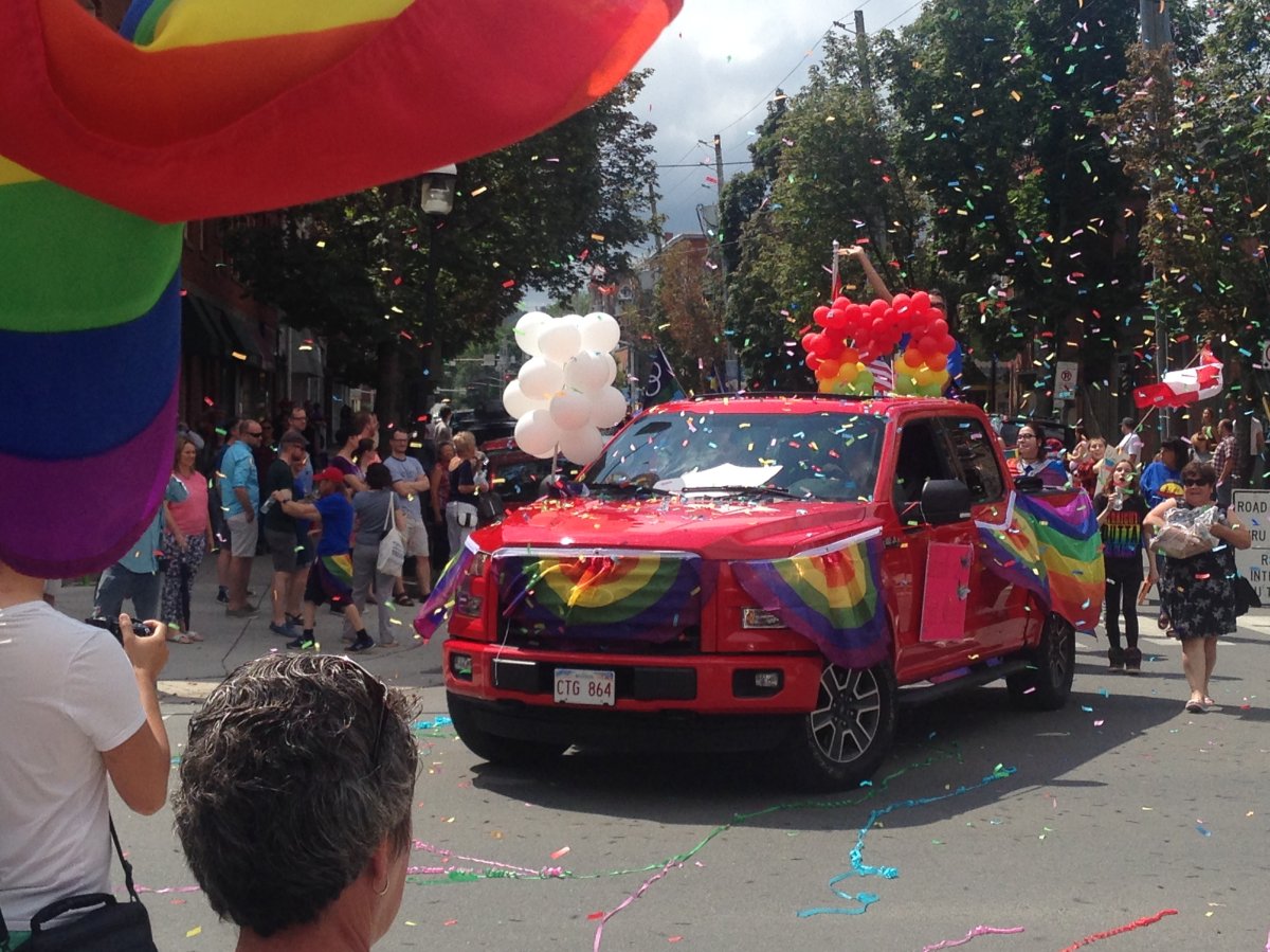 Confetti flies as Pride Parade rolls through Fredericton, NB.