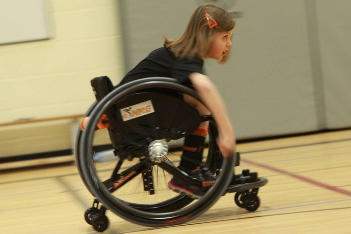 A girl in a Quickie All Court basketball wheelchair. Thieves in Saskatoon stole a trailer containing 34 of the children's basketball wheelchairs.