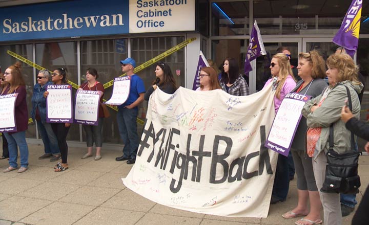 A group of younger Saskatchewan residents gathered outside the cabinet office to protest budget cuts.