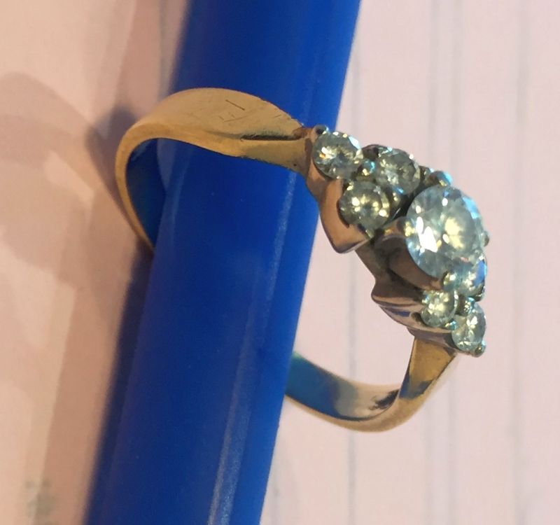 The gold and diamond engagement ring is valued at $3,000 to $4,000. 