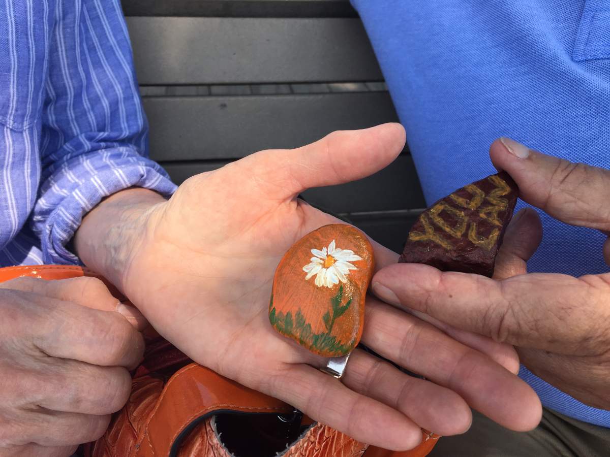 "Kindness rocks" are being placed along the boardwalk in Sainte-Anne-de-Bellevue, Tuesday, August 1, 2017.