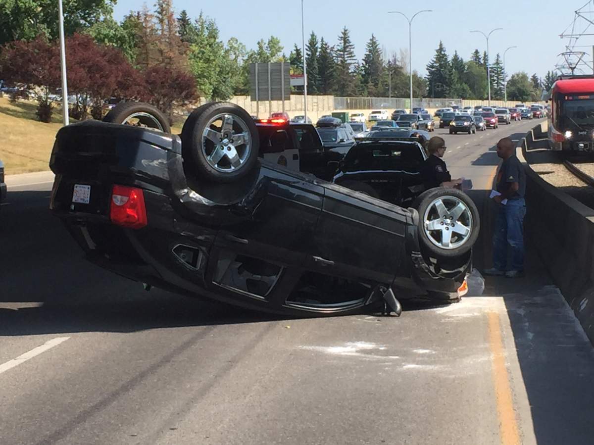 Police at the scene of a crash on Crowchild Trail and Charleswood Drive.