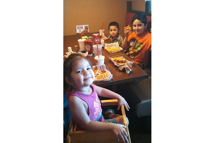 This 2014 photo provided by Virginia Saldivar shows her grandchildren Daisy, from left, Xavier and Dominic Saldivar, three of the four children presumed dead after their van sank into Greens Bayou on Houston’s east side