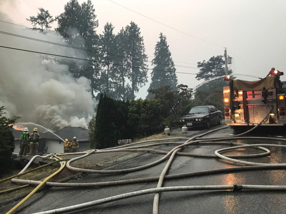 Crews with the Sasamat Volunteer Fire Department are on scene of a house fire in Belcarra.