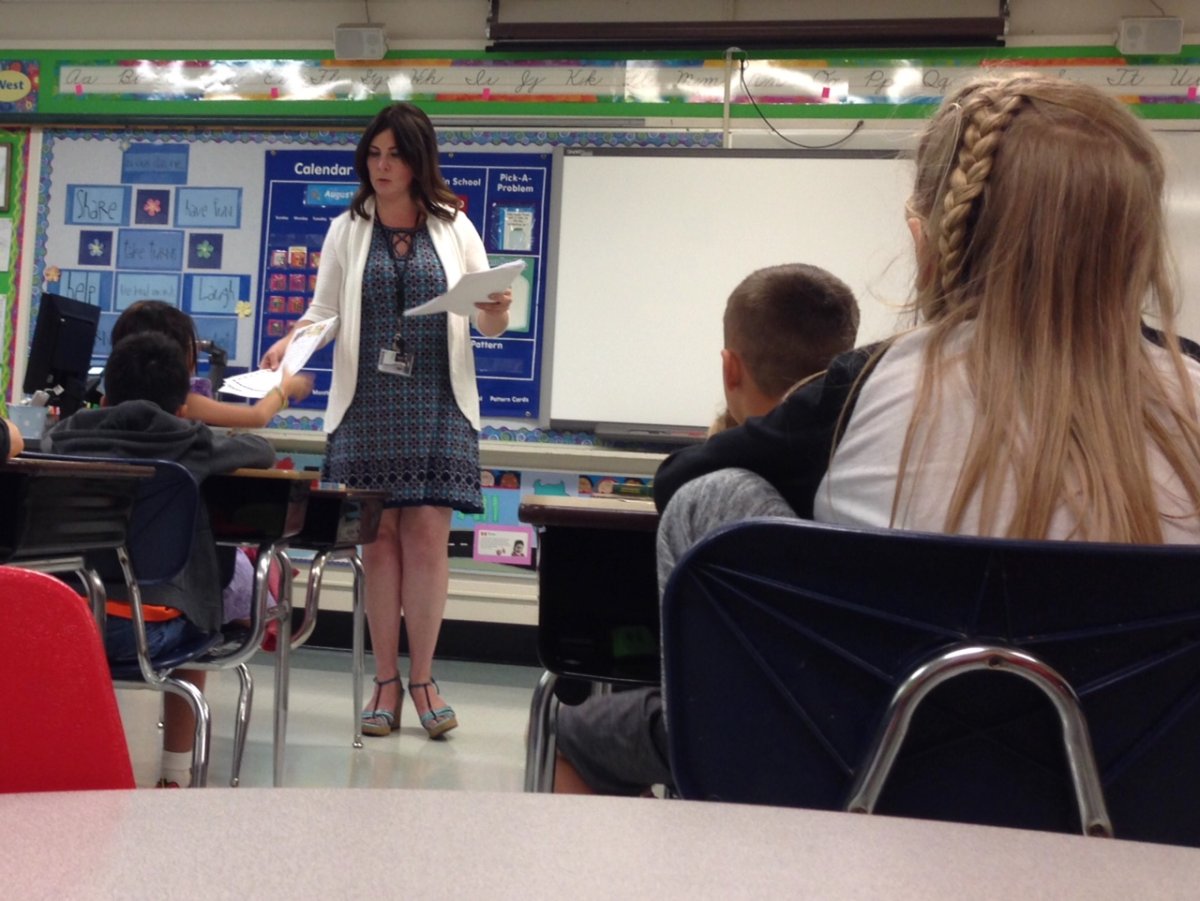 A Pine Street elementary teacher instructs her class on the first day of school. 