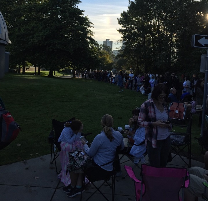 People keen on viewing the partial eclipse in Vancouver have been lining up since 5:30 a.m.