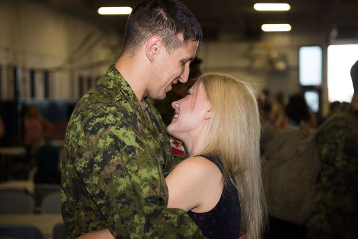 Private Sergey Kannin, a member of 1 Combat Engineer Regiment reunites back with his wife Iryna after returning from OPERATION REASSURANCE, Rotation 7 at 3rd Canadian Division Support Base, Edmonton on August 27, 2017.
